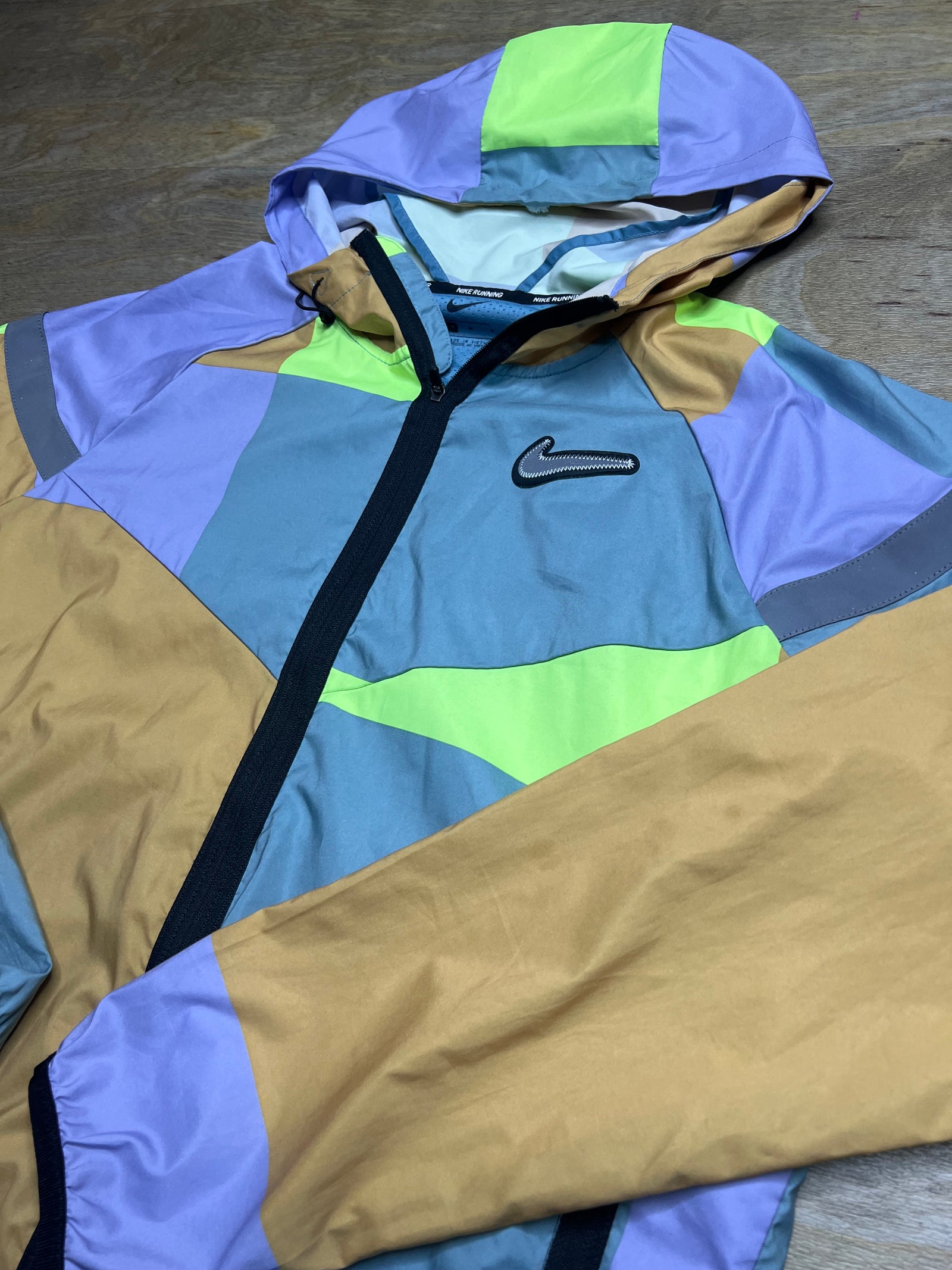 Nike Neon “Wild Run Patchwork” Windbreaker Jacket