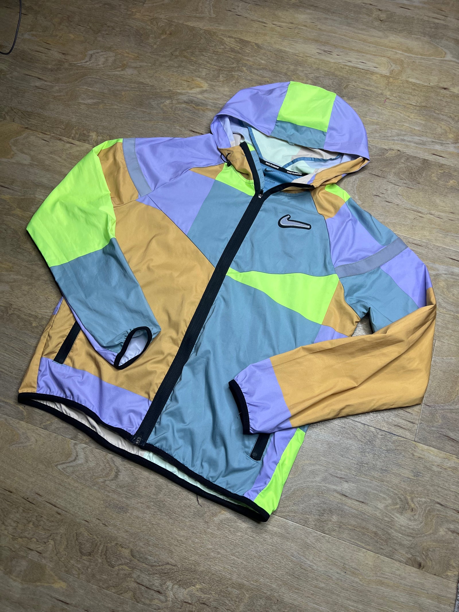 Nike Neon “Wild Run Patchwork” Windbreaker Jacket