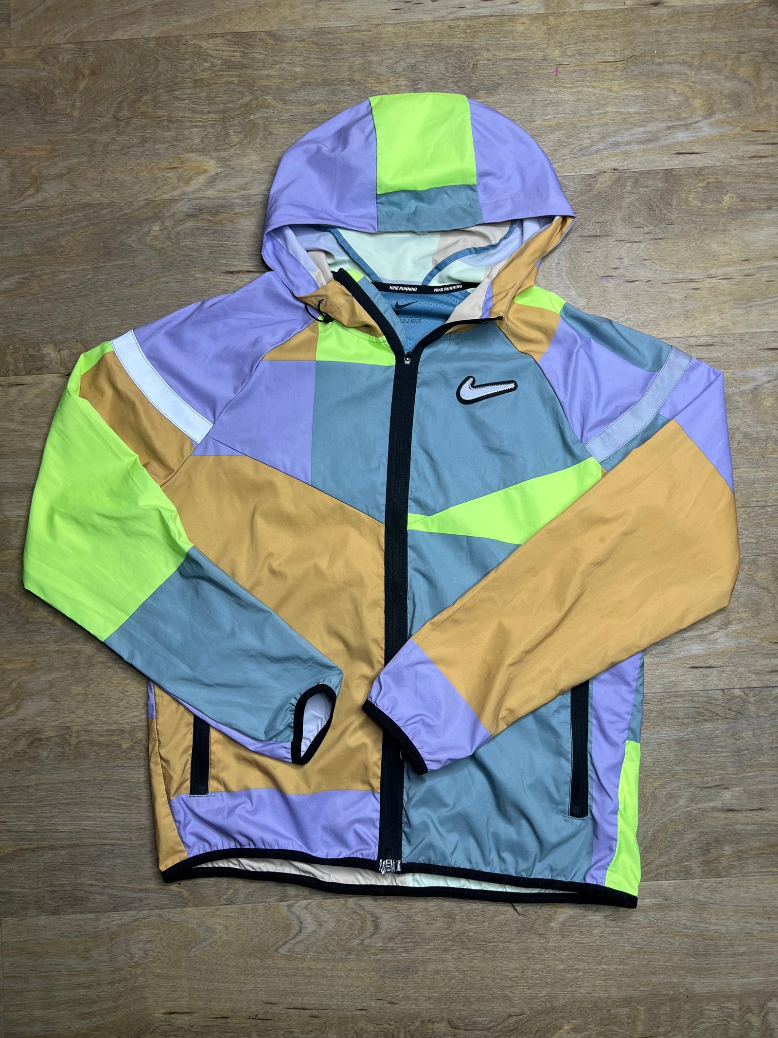 Nike Neon “Wild Run Patchwork” Windbreaker Jacket